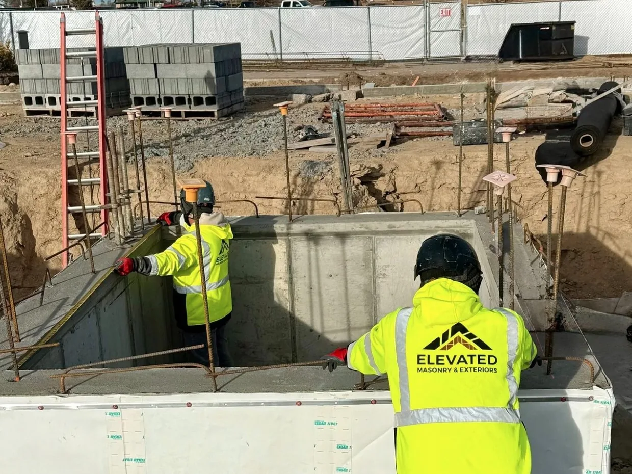 Elevated Masonry & Exteriors crew on site