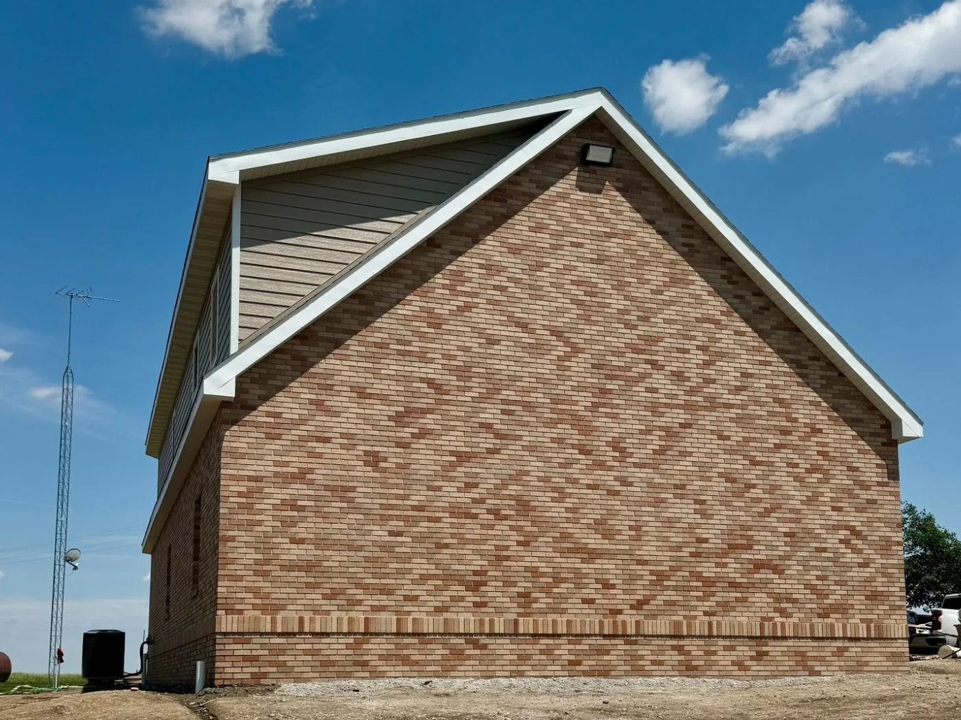 Brick gable end wall on a new home built by our Lincoln masonry crew